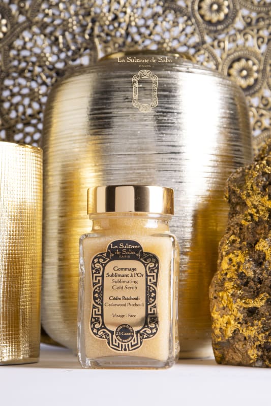 23 carat gold <br> cedarwood & patchouli fragrance<br>sublime gold face scrub 100ml